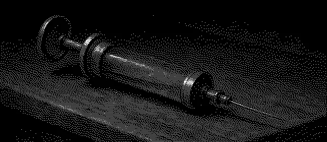 A syringe lying on a table