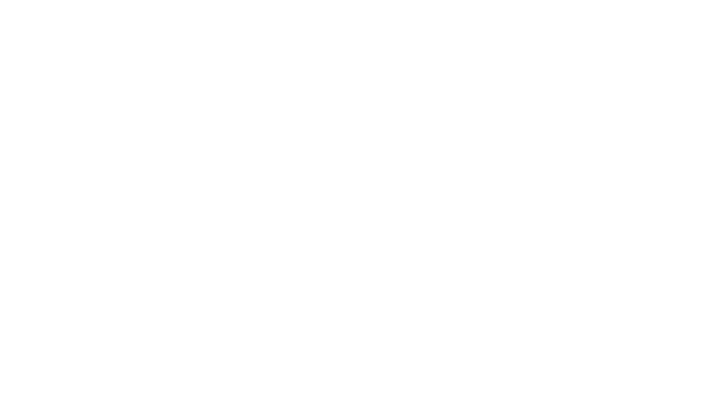 An old CRT monitor glowing on a rocky island